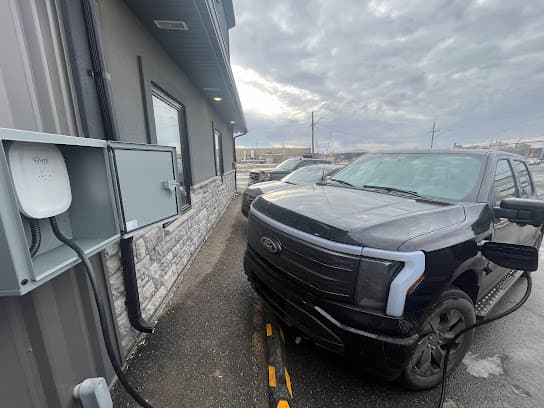 Commercial EV charger install in Regina — Ford Lightning charging at a Prairie Sun Solar site