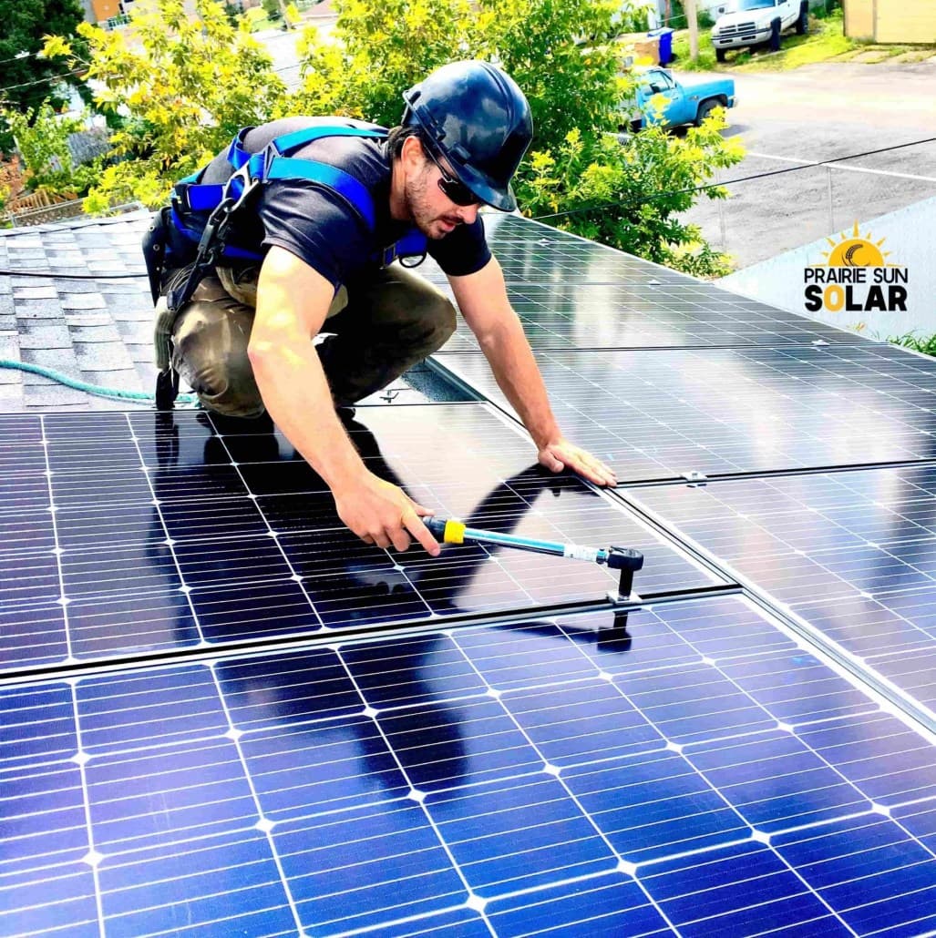 Prairie Sun Solar crew on site servicing an installed system