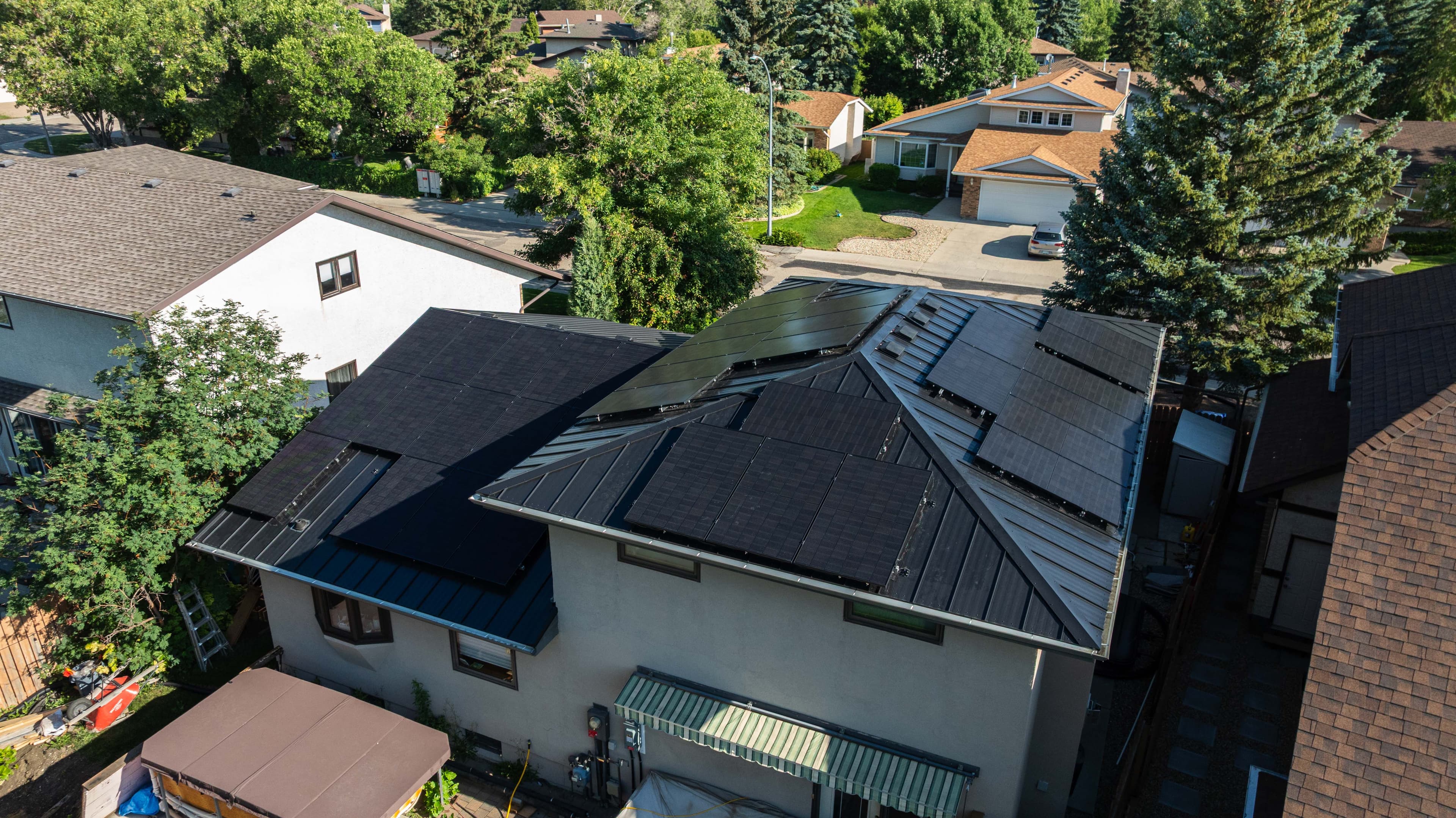 All-Black Metal-Roof Solar in Regina — 17.5 kW, 123% Offset — Regina, SK